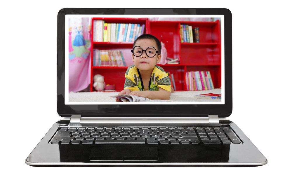 laptop com a foto de criança usando óculos